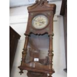 Late 19th / early 20th Century beechwood cased Vienna style wall clock with a pierced foral