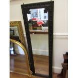 Full length carved oak framed wall mirror, 63ins x 20ins