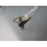 Yellow gold ring set sapphire and two diamonds with diamond set shoulders Size O-P Not hallmarked