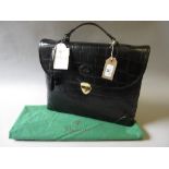 Mulberry black Congo leather briefcase having detachable shoulder strap, unused condition,