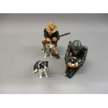 Group of three Shebeg Isle of Man pottery figures, gunman with dogs and a sheep dog