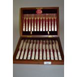 Cased set of twelve mother of pearl handled silver plated dessert knives and forks