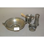 Three 19th Century pewter condiments together with a 20th Century beaten pewter shallow bowl
