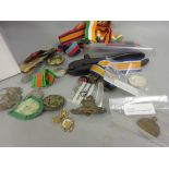 Small box containing a collection of Military related items including buttons, badges, medals,