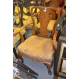 Pair of 1920's walnut low seat open elbow chairs with rams head arm rests raised on low cabriole