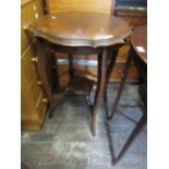 Edwardian walnut octagonal occasional table on turned supports with undertier together with a