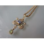 Edwardian yellow metal sapphire, peridot and split pearl pendant on a 9ct rose gold anchor link