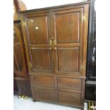 Oak bacon cupboard with moulded cornice above a pair of panelled doors with four fielded panels