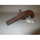 Antique double barrelled percussion cap pocket pistol with carved grip, stamped to the barrel