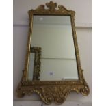 Modern rectangular gilt framed wall mirror in antique style having Prince of Wales feathers