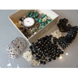 Silver nurses buckle, Continental silver cased pocket watch (at fault), Malachite bead necklace,