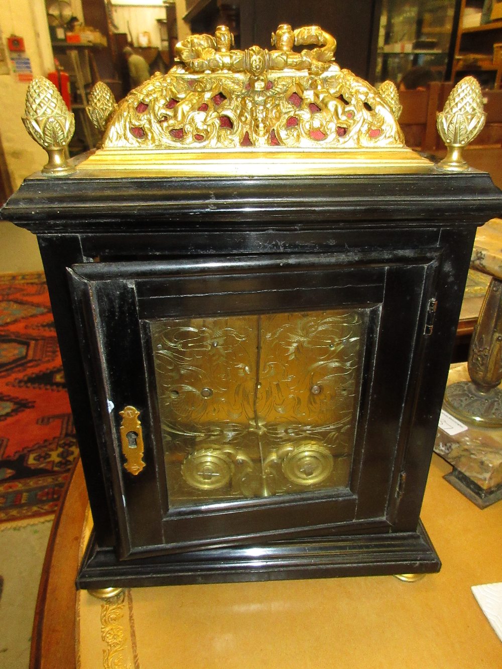 Small 18th Century ebonised and gilt brass table or bracket clock, the gilt basket top and acorn - Image 19 of 19