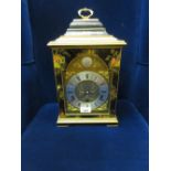 Reproduction black chinoiserie lacquer bracket clock by Elliott of London for Mappin and Webb, the