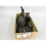 Five small black basalt type Egyptian figures together with two small carved bone figures of lions