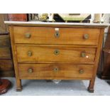 19th Century Continental fruitwood three drawer commode having white marble top, raised on square