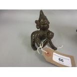 Small Eastern bronze figure of a crawling child with ball
