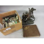 Mid 20th Century autograph album, quantity of various cigarette packets, together with a spelter