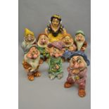Set of eight pottery figures, Snow White and the Seven Dwarfs, authorised by Walt Disney (Snow White