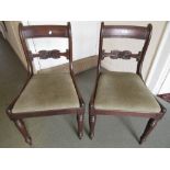 Pair of Regency mahogany rail back side chairs with drop-in seats on turned front supports