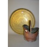 Circular Benares type brass tray with engraved decoration and a copper helmet shaped coal scuttle