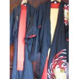 Two late 20th Century embroidered silk kimono robes with sashes