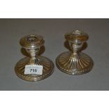 Pair of sterling silver circular dwarf candlesticks