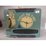 1950's Wooden cased novelty clock inscribed ' Right on Time ', with a painted figure of an owl,