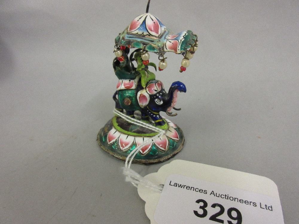 Miniature Indian enamel and silver model of figures riding an elephant