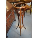 Edwardian mahogany and satinwood crossbanded jardiniere stand on splay supports