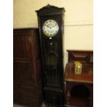 Early 20th Century oak longcase clock with a bar glazed and bevelled glass door, the circular
