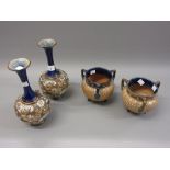 Pair of Doulton Slaters stoneware narrow neck vases together with a pair of Doulton three handled