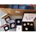 Collection of nineteen various cased silver proof coins, together with a Royal Mint one pound silver