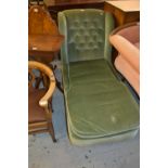 19th Century green button upholstered wing arm day bed on turned supports