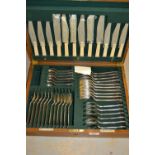 Six place setting canteen of silver plated cutlery by Garrard and Co. in a fitted oak case