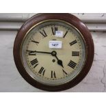 Small circular mahogany wall clock, the 8in dial with Roman numerals and single train spring