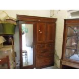 Edwardian mahogany crossbanded and inlaid wardrobe having moulded top above single full length