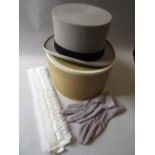 Hat box containing a grey top hat by Christy's, London, pair of grey gloves and a detachable shirt