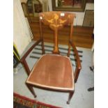 Edwardian rosewood and mahogany open armchair of Art Nouveau design, the marquetry inlaid back