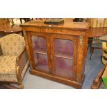 19th Century walnut floral inlaid and crossbanded pier cabinet having two glazed doors with gilt