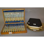 Oak cased set of twelve silver plated fish knives and forks together with a cased set of six