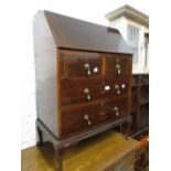 Edwardian mahogany bureau together with an Edwardian oval mahogany and line inlaid two tier