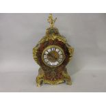 Late 19th or early 20th Century buhl red stained tortoiseshell and cut brass two train mantel clock