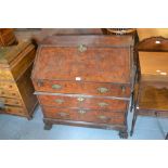 Early 18th Century walnut and herringbone crossbanded bureau, the fall front enclosing a fitted