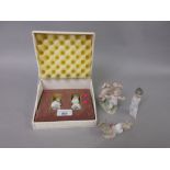 Two miniature Lladro figures of boy angels, boxed and three similar figures (no boxes)