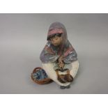 LLadro pottery figure of a seated fish seller