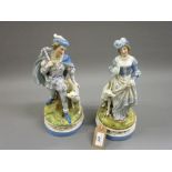 Pair of late 19th Century Continental porcelain figures of a lady with a dog and a gentleman