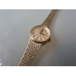 Ladies 9ct gold cased wristwatch by Rotary with an integral articulated bracelet 17g total weight