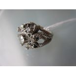 White metal and filigree wirework nine stone diamond set ring