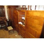 Mid 20th Century Continental figured walnut three section side cabinet, the centre with a door above