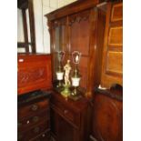 Victorian mahogany secretaire bookcase, the moulded cornice above two glazed doors, the base with
